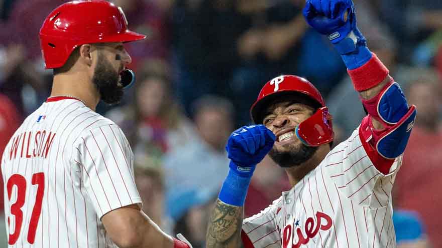 Phillies wrap up a 1st-round bye, hitting a team-record 8 homers to rout the Marlins