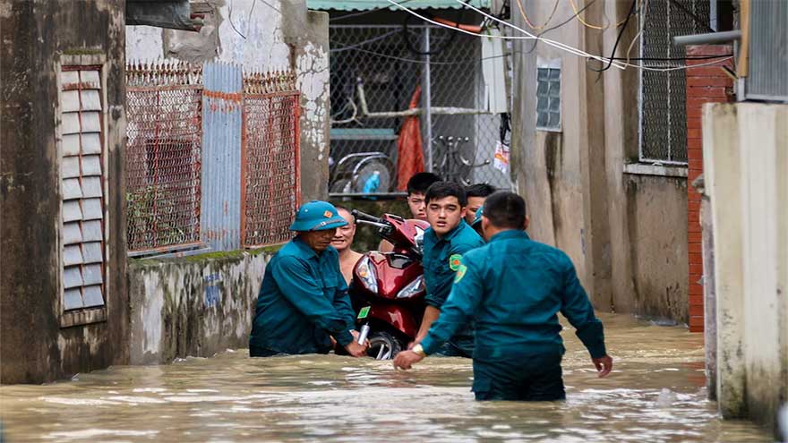 Rains from Typhoon Bualoi flood homes in Hanoi, disrupt transport