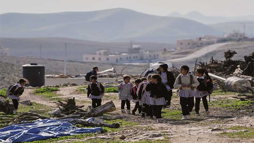 Israeli settlers block Palestinian kids' path to school with tear gas and barbed wire