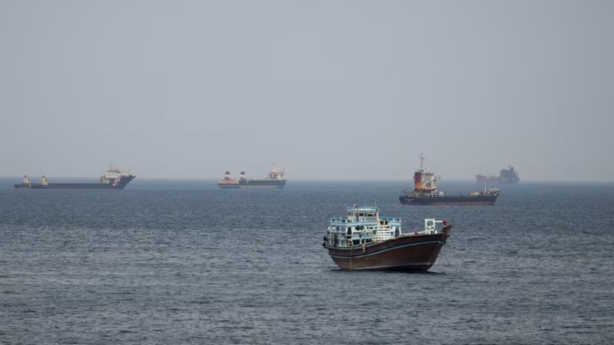 Iran seizes ships in strait after Trump halts attacks