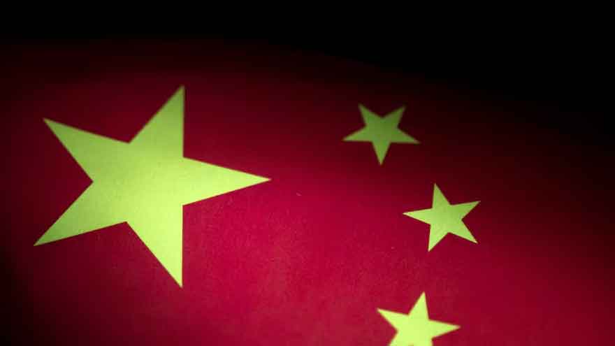 China conducts naval, air patrols around disputed shoal in South China Sea