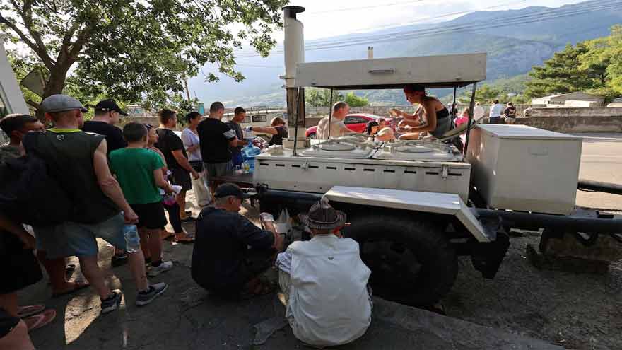 Crimean families queue for hot meals as Ukraine hits power supply