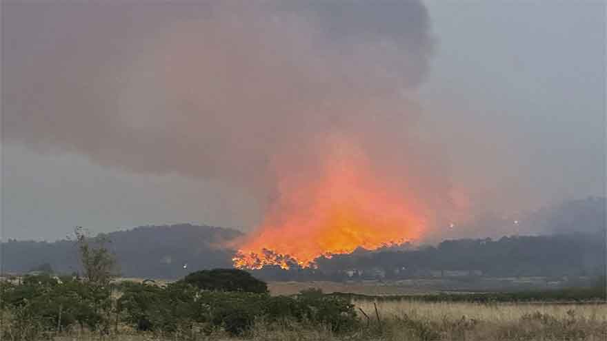 Europe's wildfire crisis fractures as Greece evacuates and France guards megafire scar