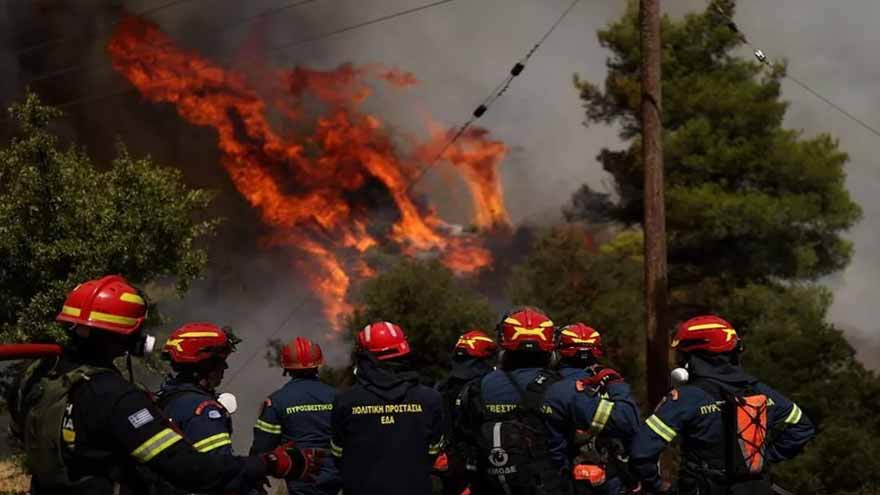 Two die as firefighting helicopters collide in Greece, French blaze changes course