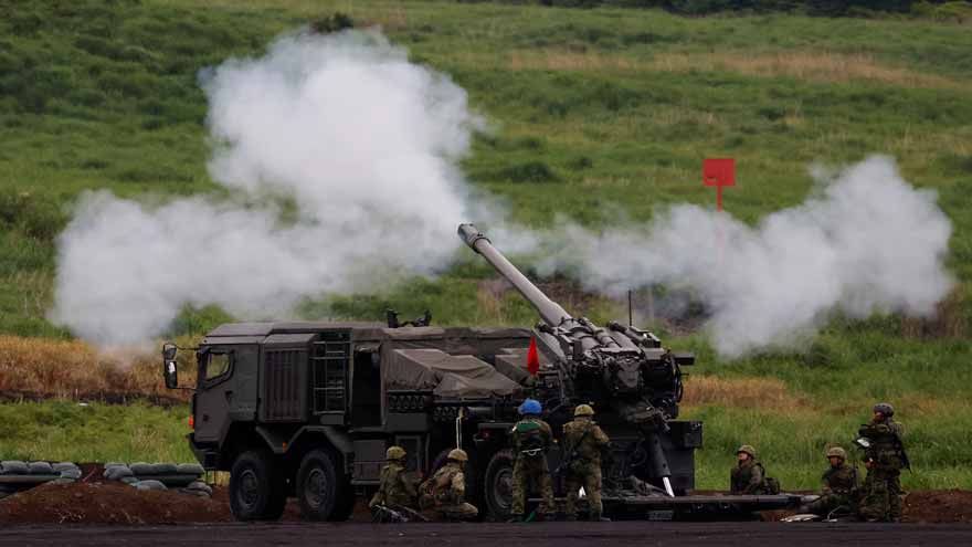 Japan casts military buildup as path to economic prosperity