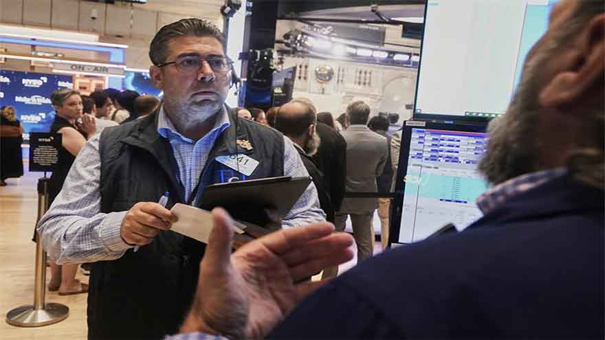 US stocks leap toward a record as profits keep piling up and oil prices ease
