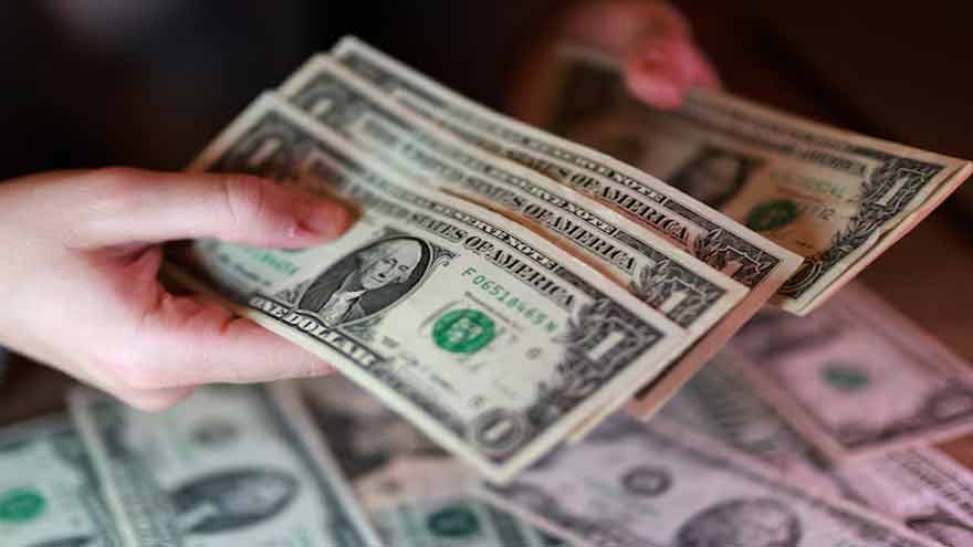 Dollar trading near multi-month lows, restrained by debt nerves