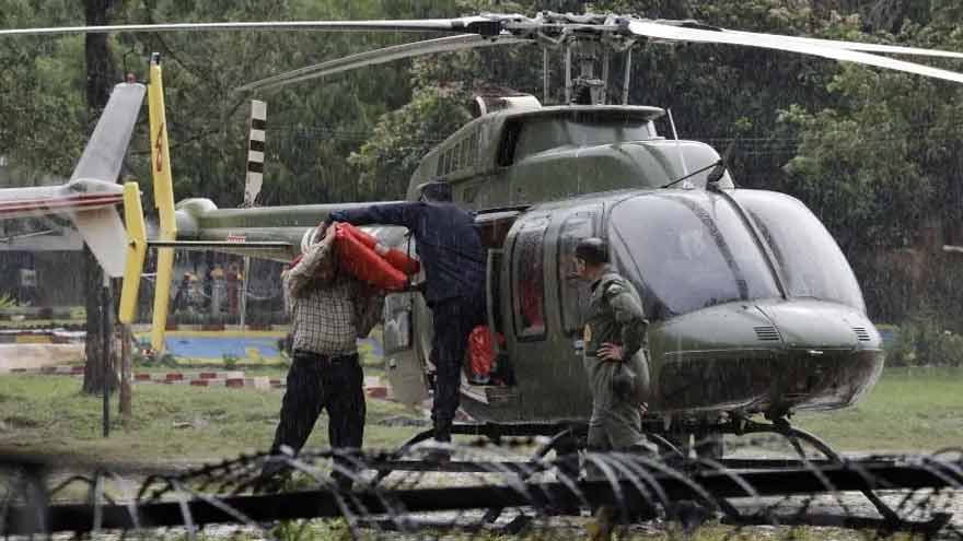 Rescuers claw through mud as Nepal, China flood death toll climbs to 675