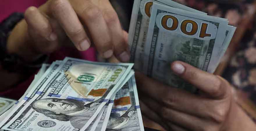 Dollar holds gains on economic data, Fed bets; Aussie advances before RBA