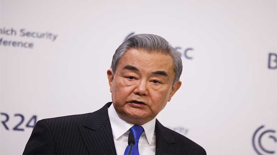 China's top diplomat warns against 'knee-jerk' calls for decoupling