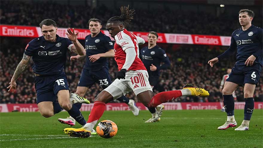 Quadruple chasing Arsenal rout Wigan to reach FA Cup fifth round