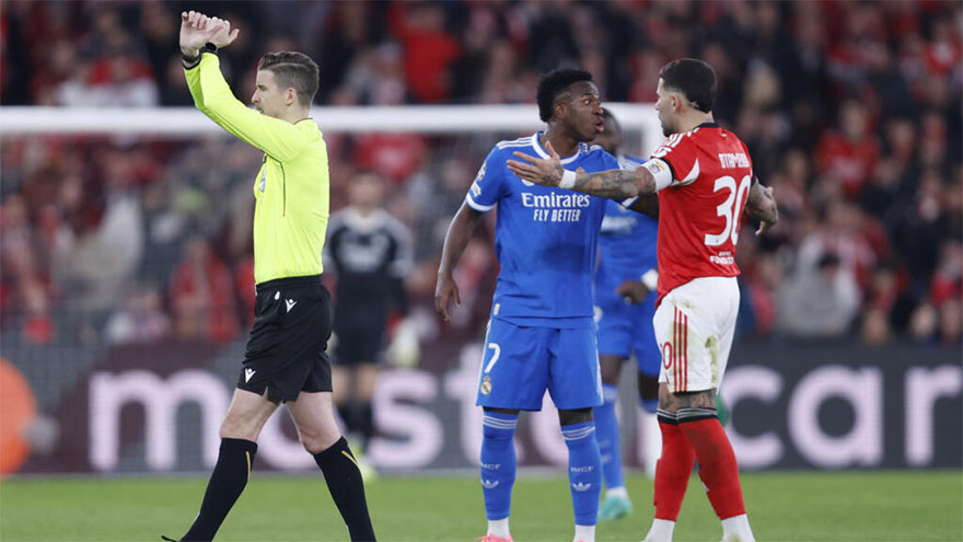 Vinicius stunner helps Real Madrid edge Benfica in play-off marred by alleged racism