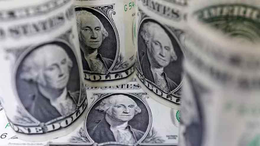 Dollar rallies as traders look past Venezuela to flurry of US data