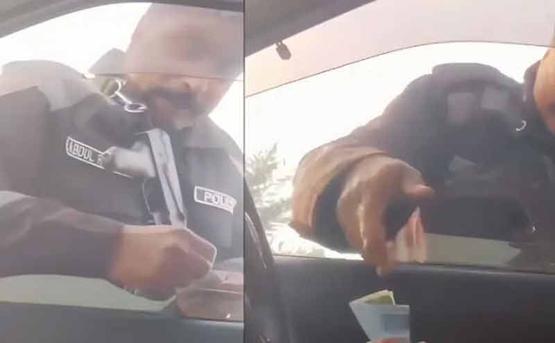 Lahore cop caught taking bribe while saying 'Bismillah'