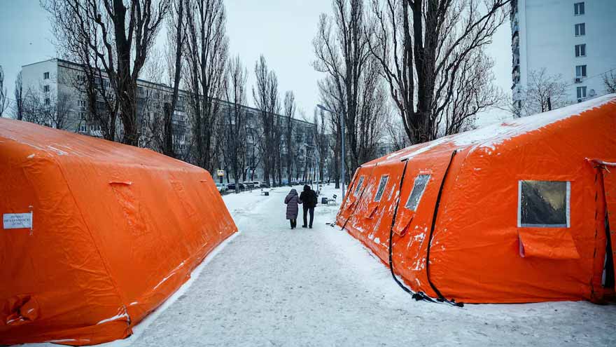 Ukraine's two largest cities under Russian attack, officials say one dead