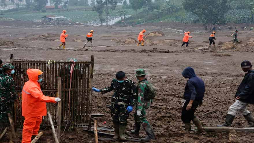 Search for 32 people missing in Indonesia landslide hampered by rain as death toll rises to 34