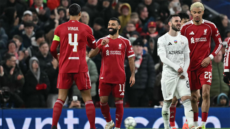 Salah ends drought as Liverpool hit Qarabag for six to reach Champions League last 16