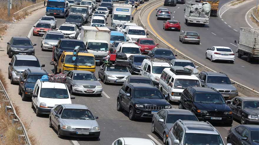 Hundreds of thousands of Lebanese head home as fighting eases, many still stranded