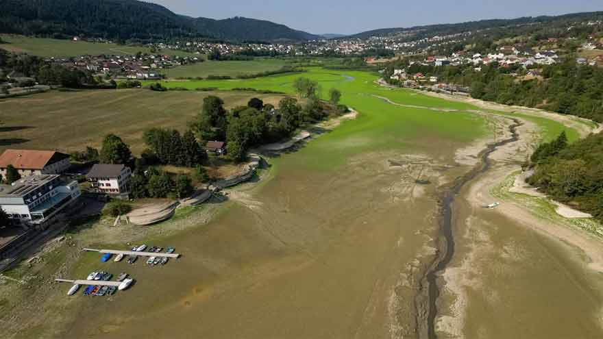 Drought leaves Swiss border lake popular with tourists all but drained