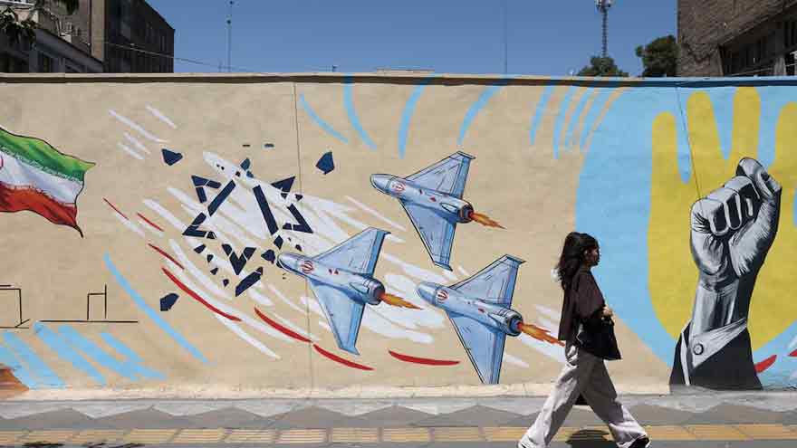 US says it struck Iranian military sites, Tehran responds with air base attack