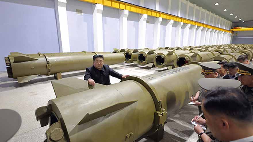 North Korea's Kim orders increase in missile production during factory visit