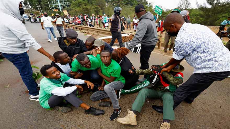 Kenya police fire tear gas, arrest ex chief justice at national park protest