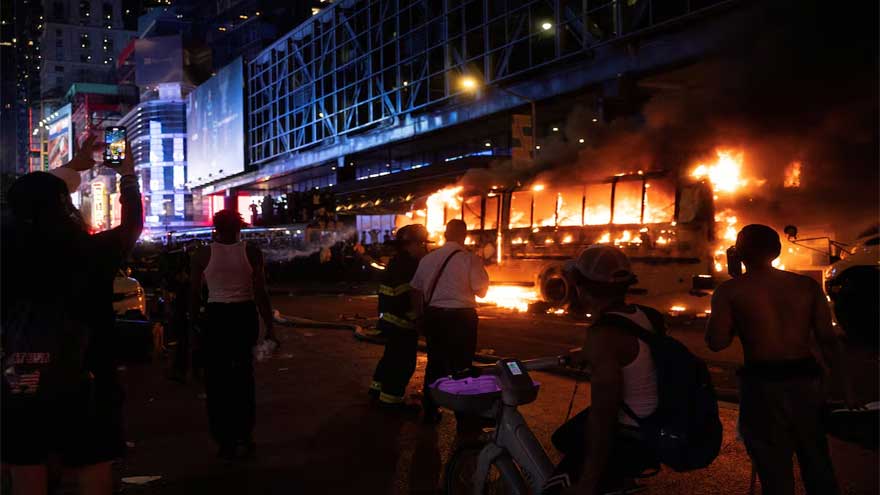 World Cup bus set alight as chaotic celebrations erupt in Manhattan after Knicks win