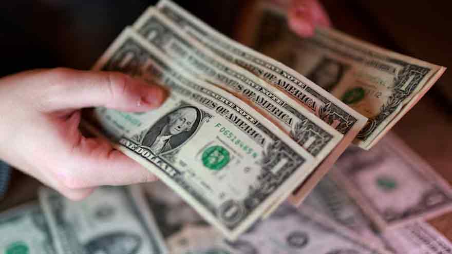 Dollar sways near 10-day lows, yen at 160 after BOJ hikes as expected