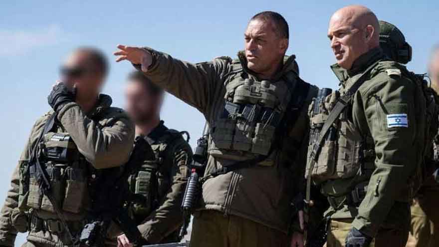 Israeli forces advance into Syrian border areas