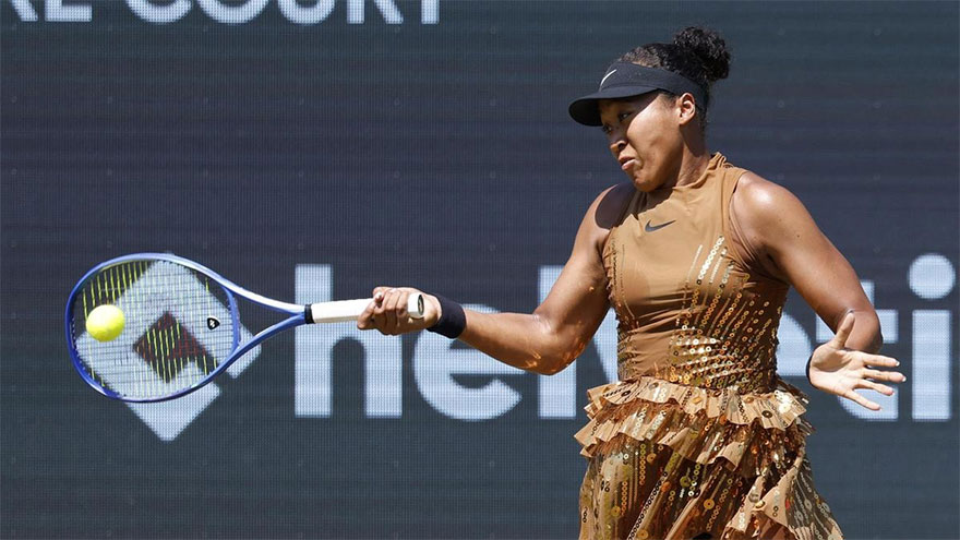 Osaka sinks Wang to reach first grass court final