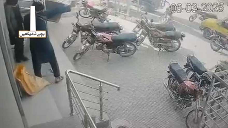 Police officer thwarts bank robbery despite being shot five times