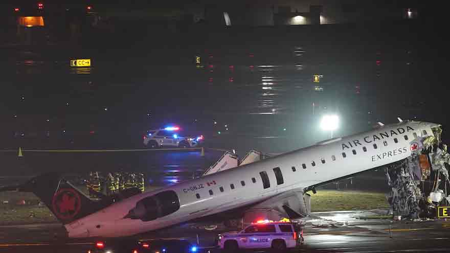 Pilot, co-pilot killed after passenger jet hits truck at New York's LaGuardia airport