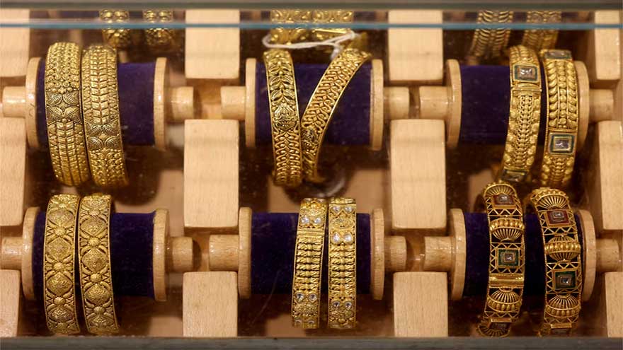 Gold steady as markets assess Mideast tensions ahead of US inflation data
