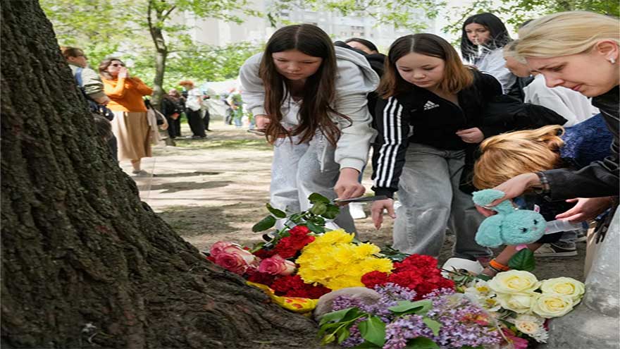 Kyiv mourns as death toll from Russian attack in the Ukrainian capital rises to 24