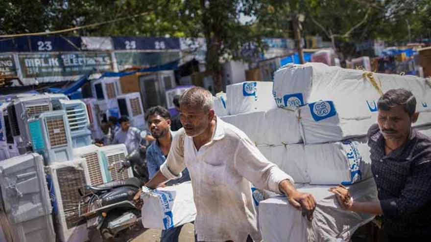 India battles power cuts as heatwave boosts electricity demand to record