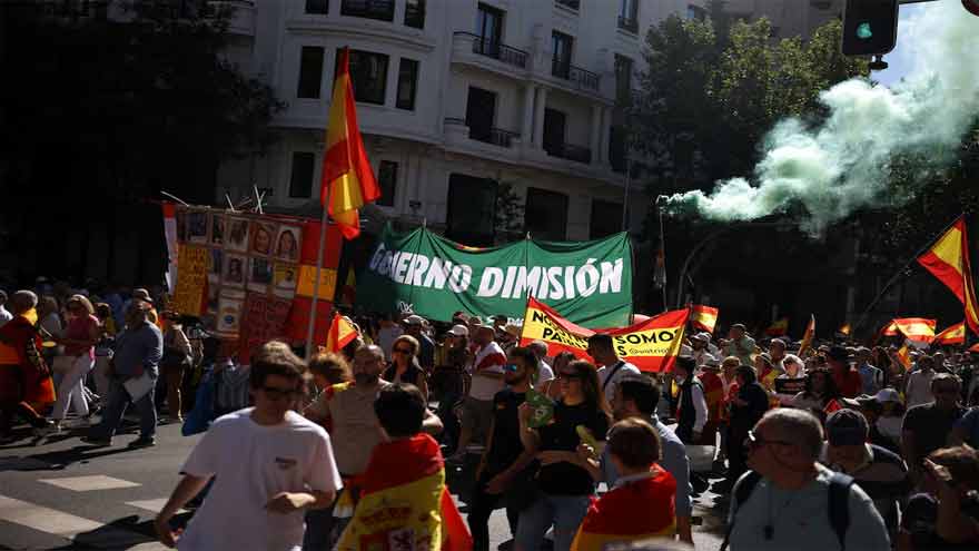 Tens of thousands march in Madrid to demand prime minister's resignation