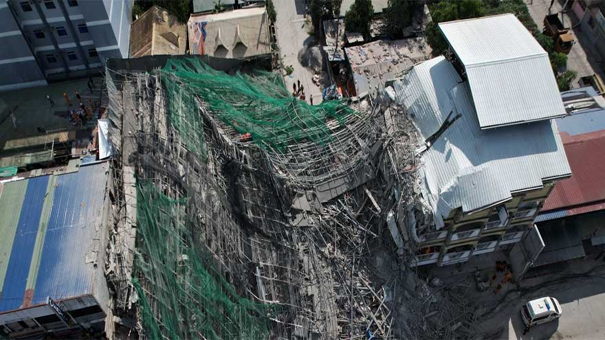 Building under construction in Philippines collapses, leaving 1 dead and 21 trapped