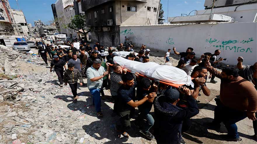 Palestinians mourn slain Hamas chief as Israel escalates Gaza attacks