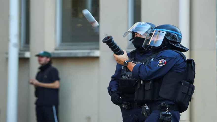 France suspends use of stun grenades to police student protests