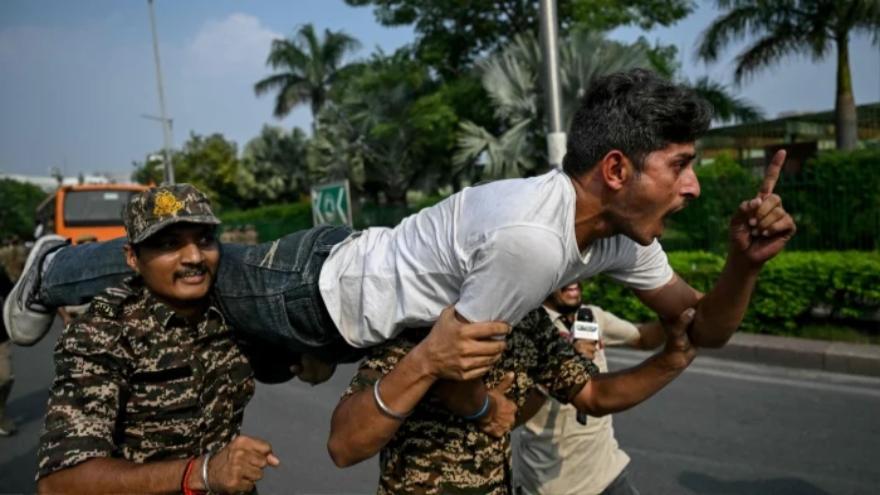 India detains top 'cockroach' leaders after flash protest