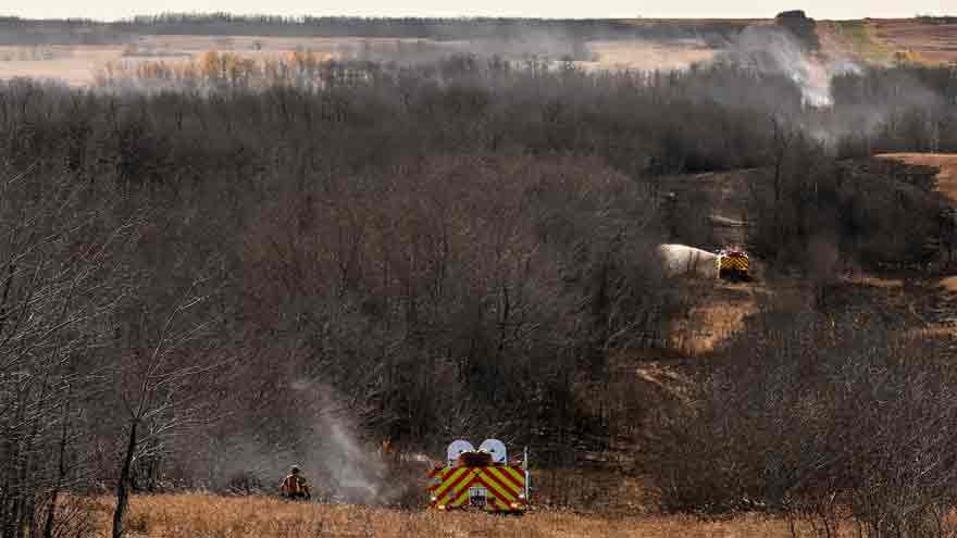 Strong winds fueled grass fire at Canadian military base that killed four