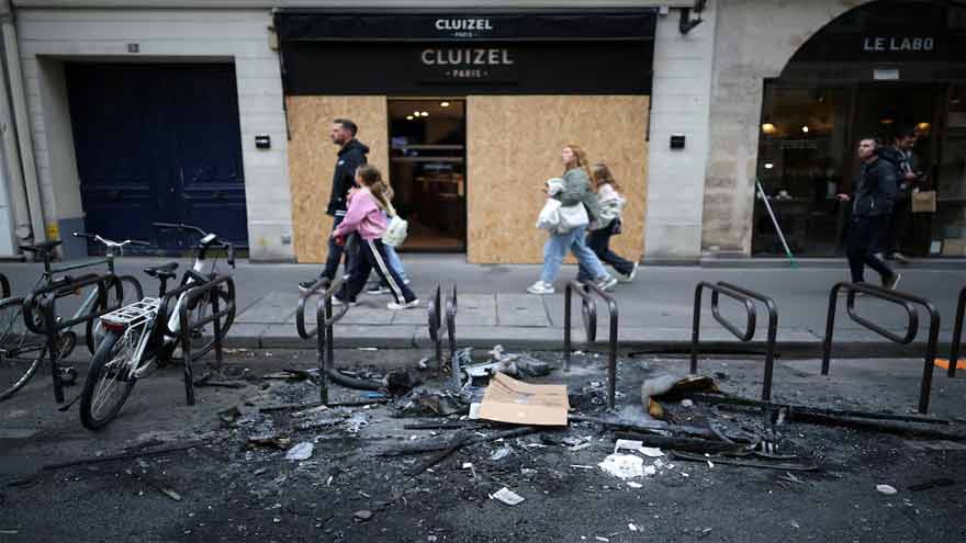France's Macron tightens curbs on protests, blaming hard left for unrest
