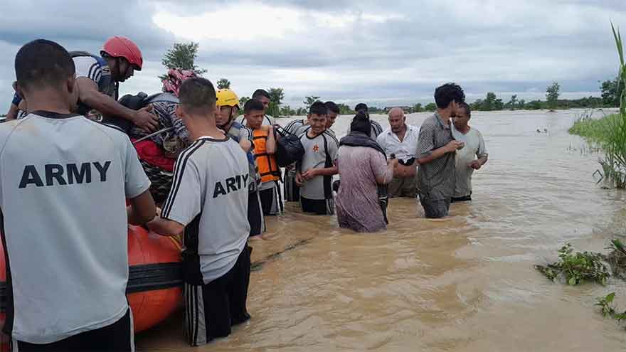 Mass burials in Nepal as death toll from flash floods exceeds 1,000