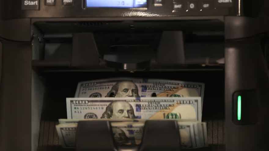 Dollar holds firm at nearly two-week high as Middle East hostilities lift oil