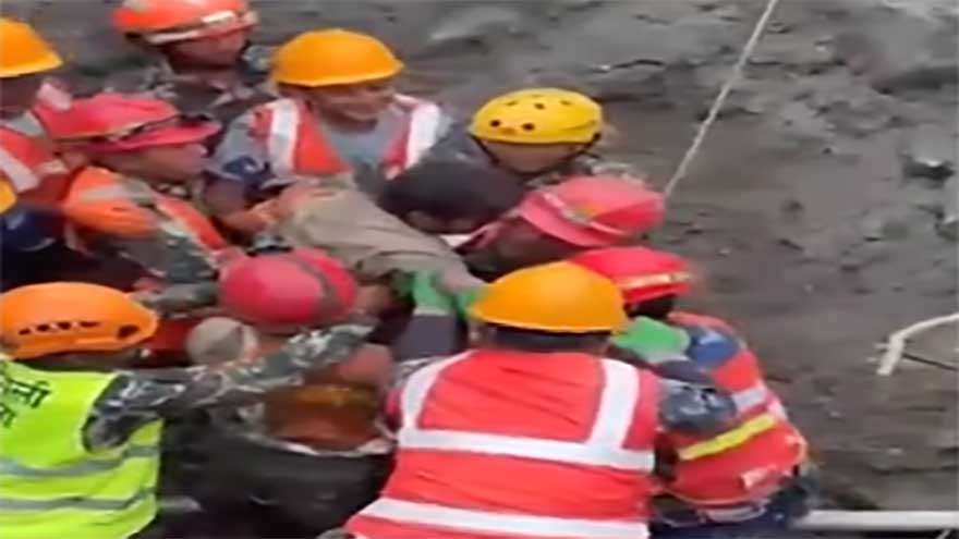 Rescuers pull 2 trapped workers from a hydropower tunnel 9 days after Nepal floods