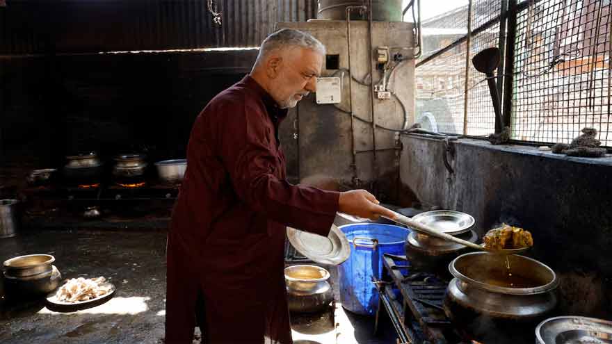 Kashmir's 600-year-old wedding-feast tradition adapts to modern times